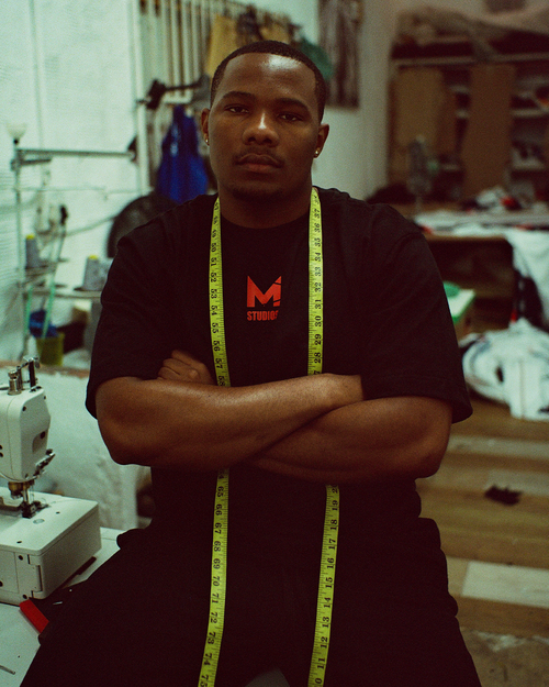 M Studios Essential T-Shirt